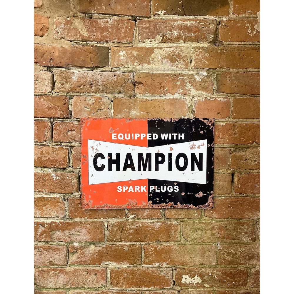 Vintage Metal Signs - Champion Spark Plugs wall view